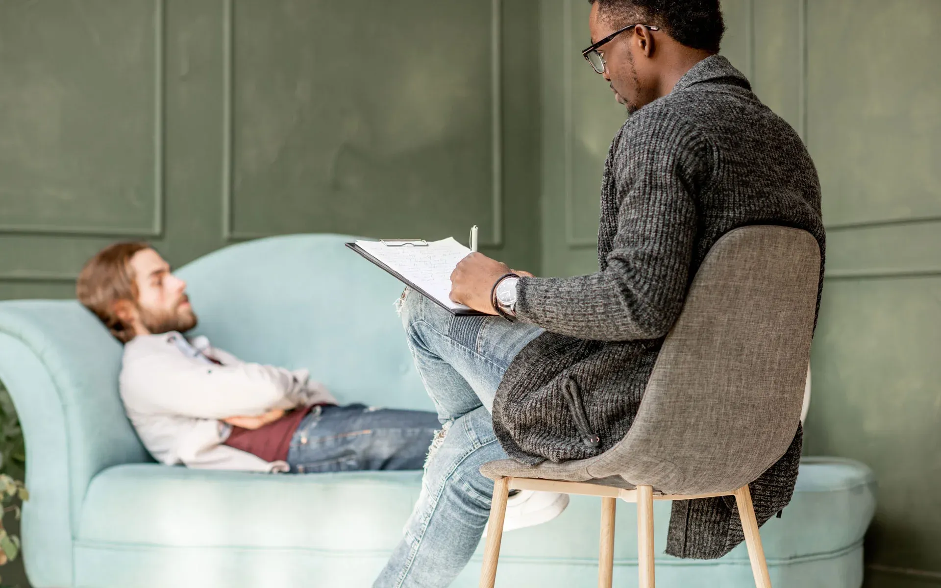 A person listening closely during a calm conversation.