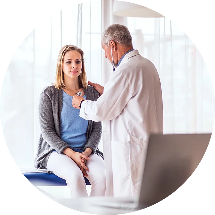 Doctor checking a patient with a stethescope