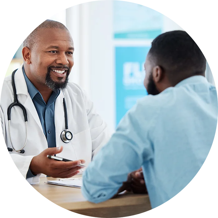Doctor smiling at a patient